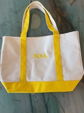New never used SoulCycle yellow and white embroidered tote bag